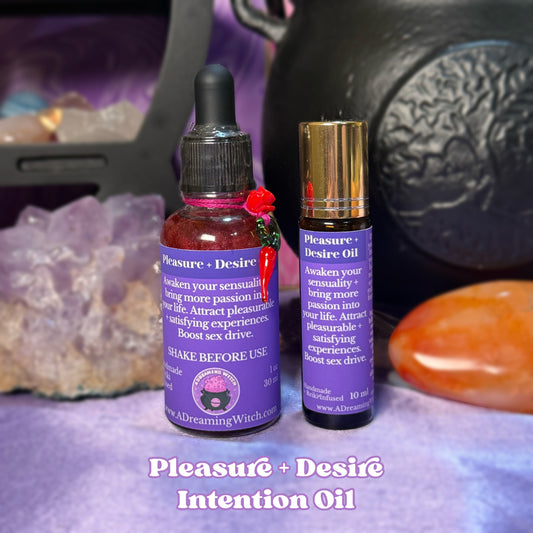 Two bottles of 'Pleasure + Desire Intention Oil' with crystals and a black cauldron in the background.