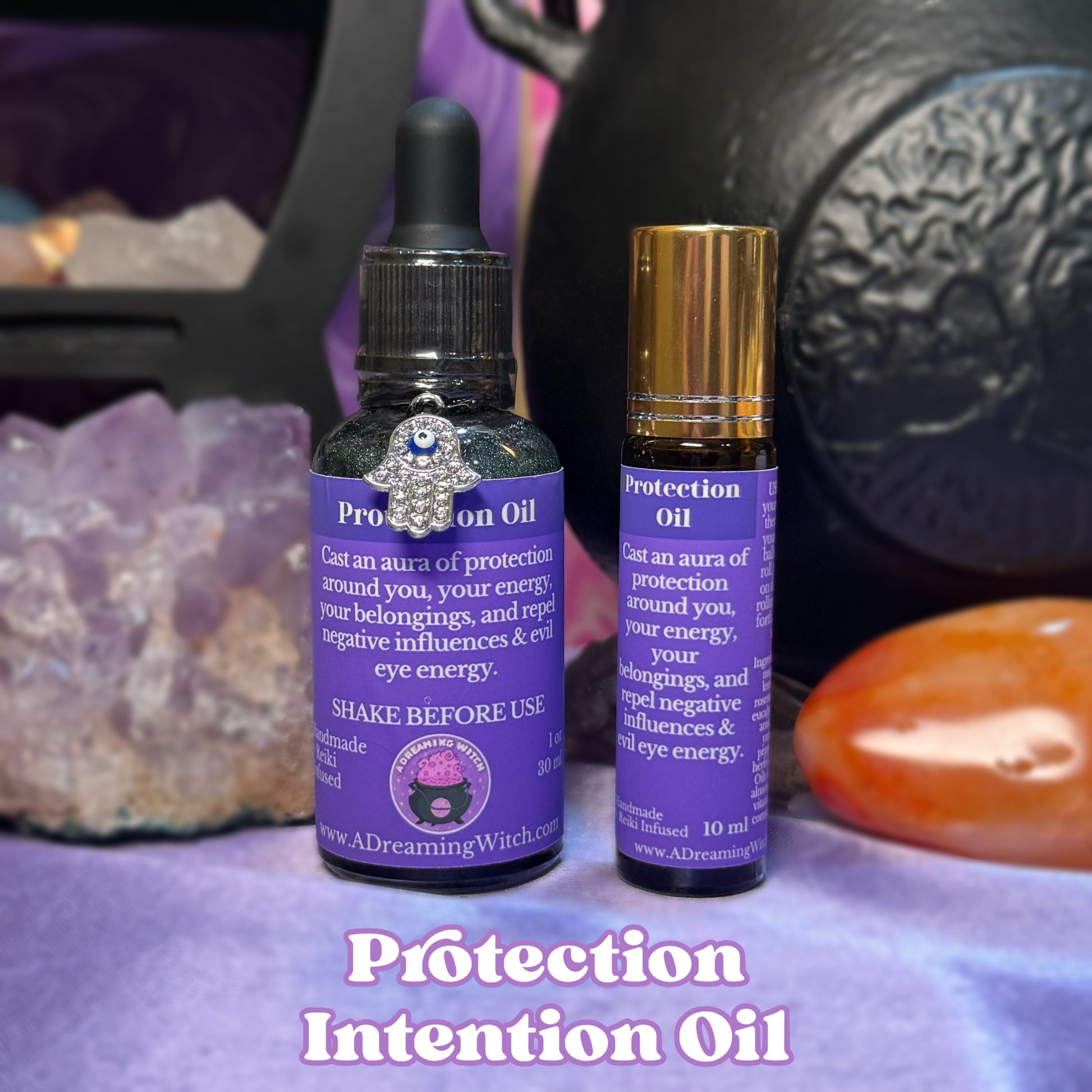 Two bottles of 'Protection Intention Oil' with purple labels on a mystical background.